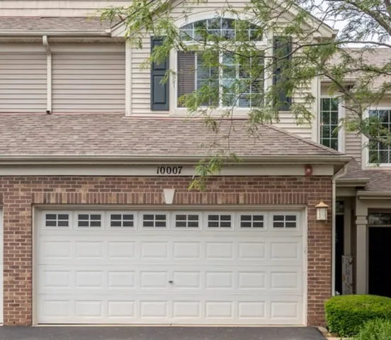 a front view of a building with glass windows
