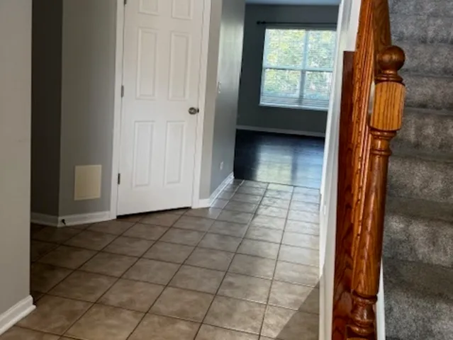 a view of entry way with wooden door