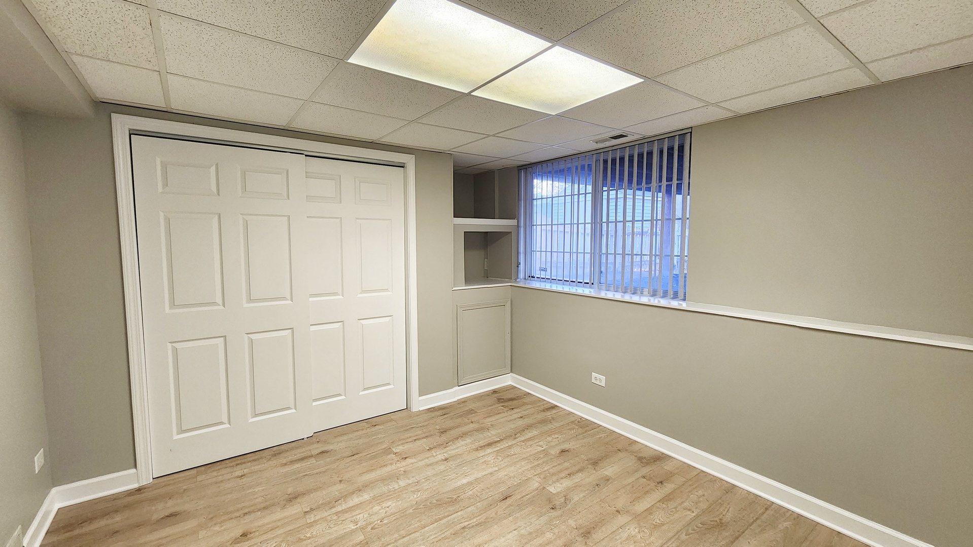 1296 Spaulding Road Bartlett, IL 60103 - Photo 29 of 37 a view of empty room with wooden floor and entryway