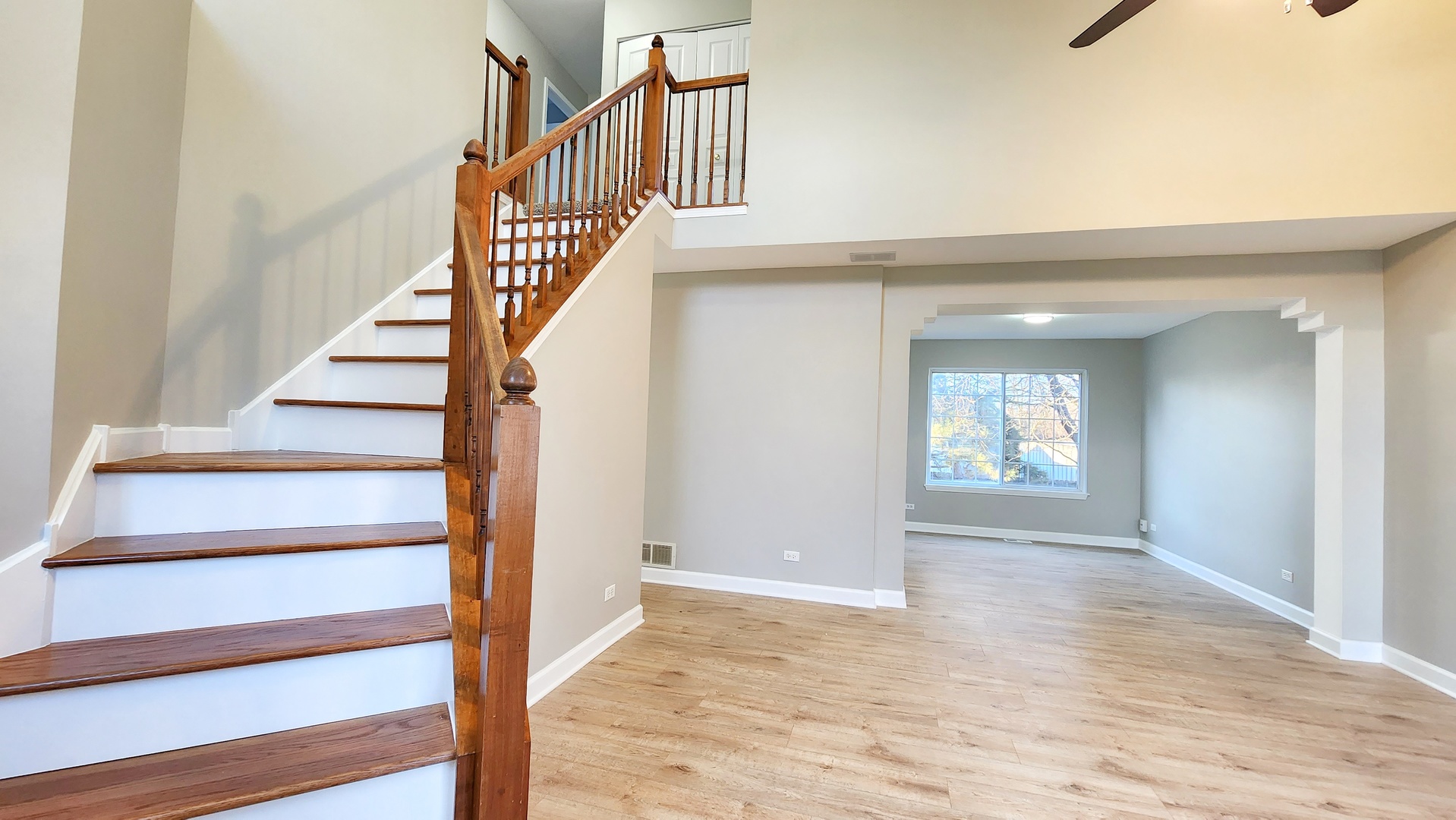 1296 Spaulding Road Bartlett, IL 60103 - Photo 3 of 37 a view of entryway and hall with wooden floor