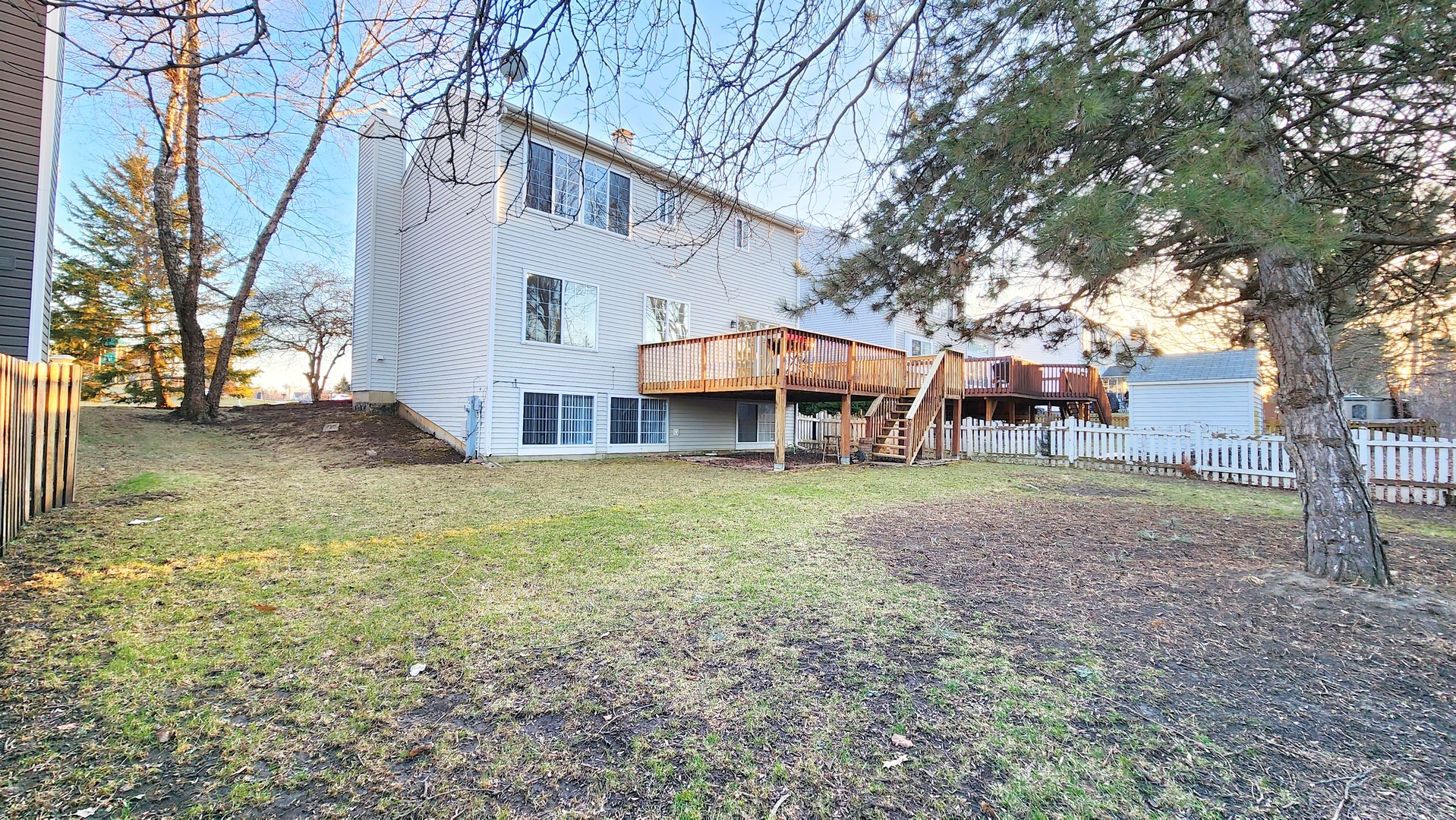 1296 Spaulding Road Bartlett, IL 60103 - Photo 35 of 37 a view of a house with a yard and sitting area
