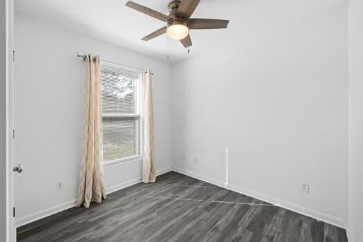 30 Lowery Road Freeport, FL 32439 - Photo 21 of 40 an empty room with wooden floor fan and windows