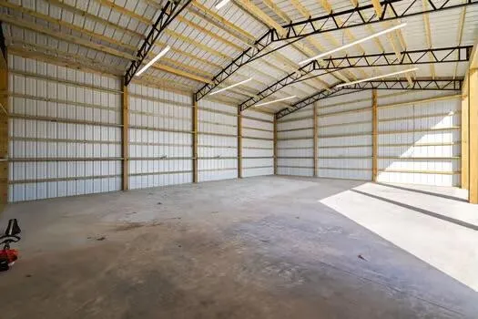 a view of a room with wooden walls