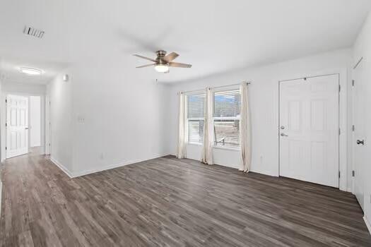 30 Lowery Road Freeport, FL 32439 - Photo 9 of 40 a view of empty room with wooden floor and ceiling fan