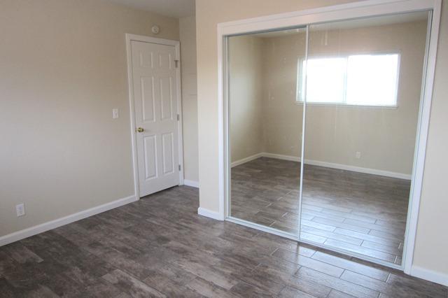 3139 Williamsburg Drive San Jose, CA 95117 - Photo 8 of 12 an empty room with wooden floor