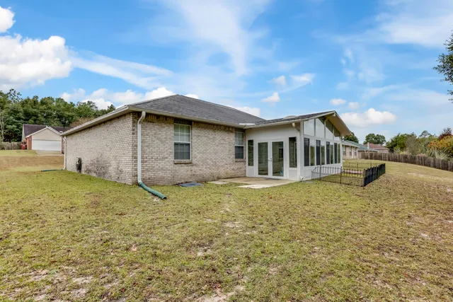 a house view with a garden space