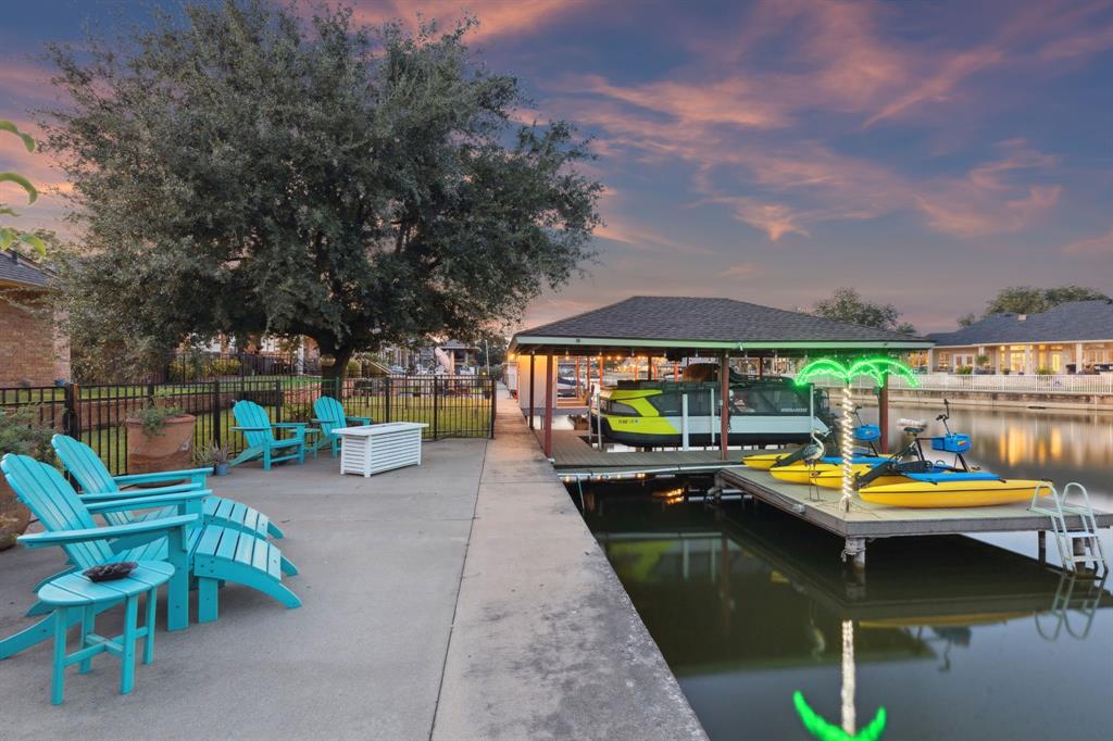 2325 River Road Granbury, TX 76048 - Photo 11 of 40 an outdoor space with swimming pool and furniture