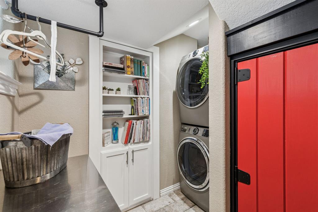 2325 River Road Granbury, TX 76048 - Photo 27 of 40 a view of a storage and utility room with a sink