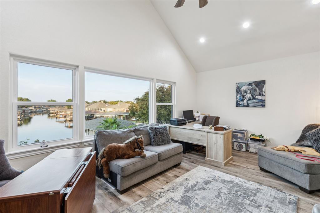 2325 River Road Granbury, TX 76048 - Photo 34 of 40 a living room with furniture and a large window