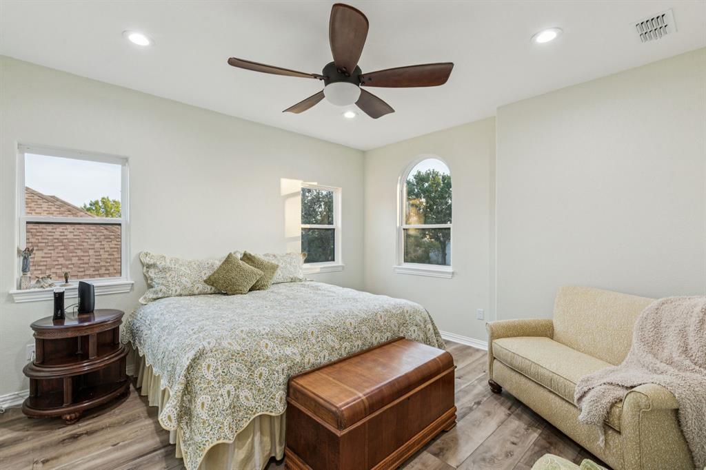 2325 River Road Granbury, TX 76048 - Photo 39 of 40 a bedroom with a bed and a window