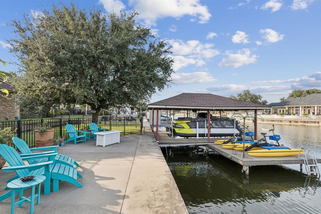 2325 River Road Granbury, TX 76048 - Photo 8 of 40 a view of swimming pool with chairs in roof deck