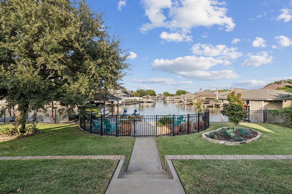2325 River Road Granbury, TX 76048 - Photo 9 of 40 a view of a park with large trees