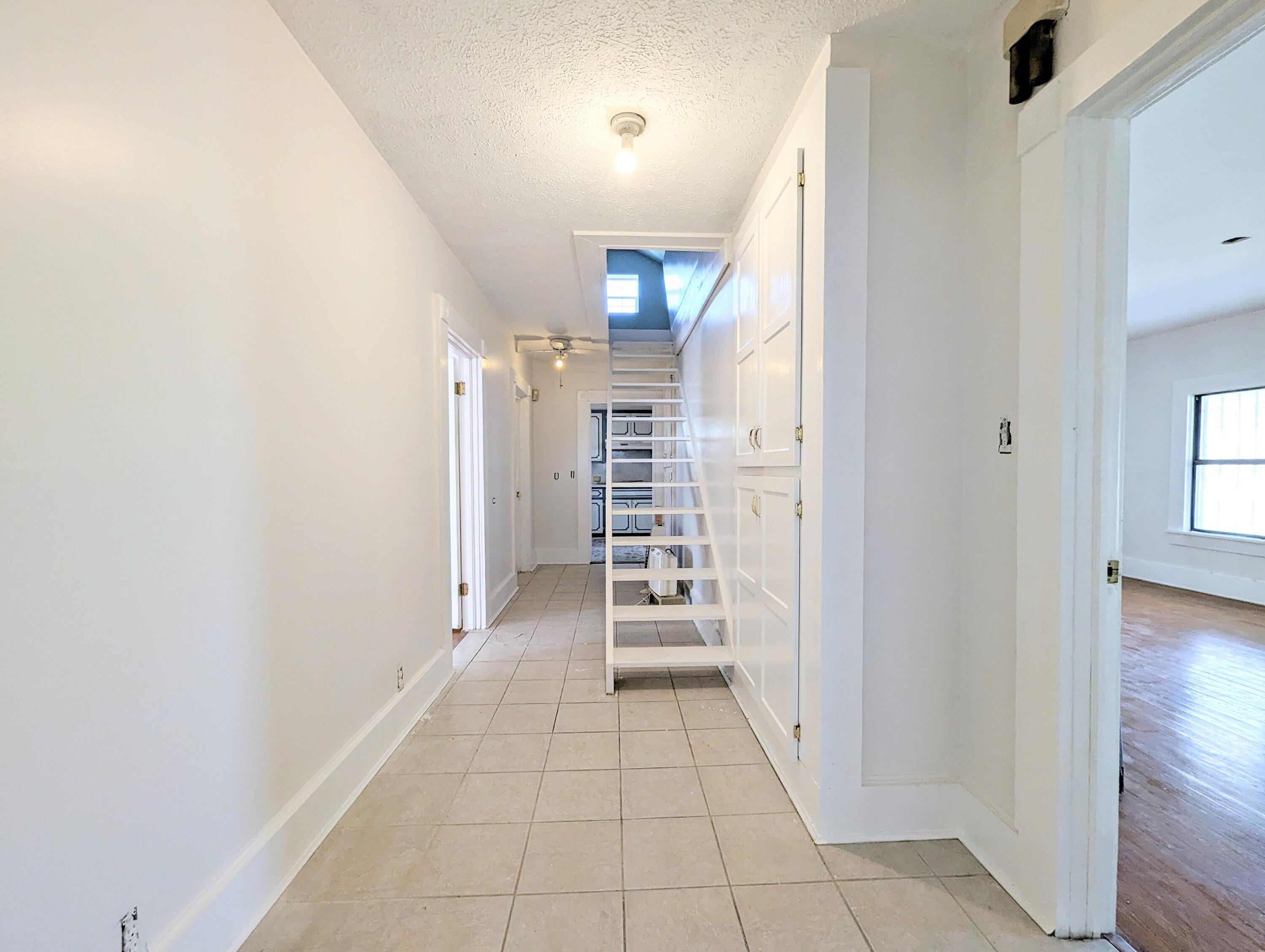 1335 Old Bonifay Road Chipley, FL 32428 - Photo 24 of 31 wooden floor in an empty room