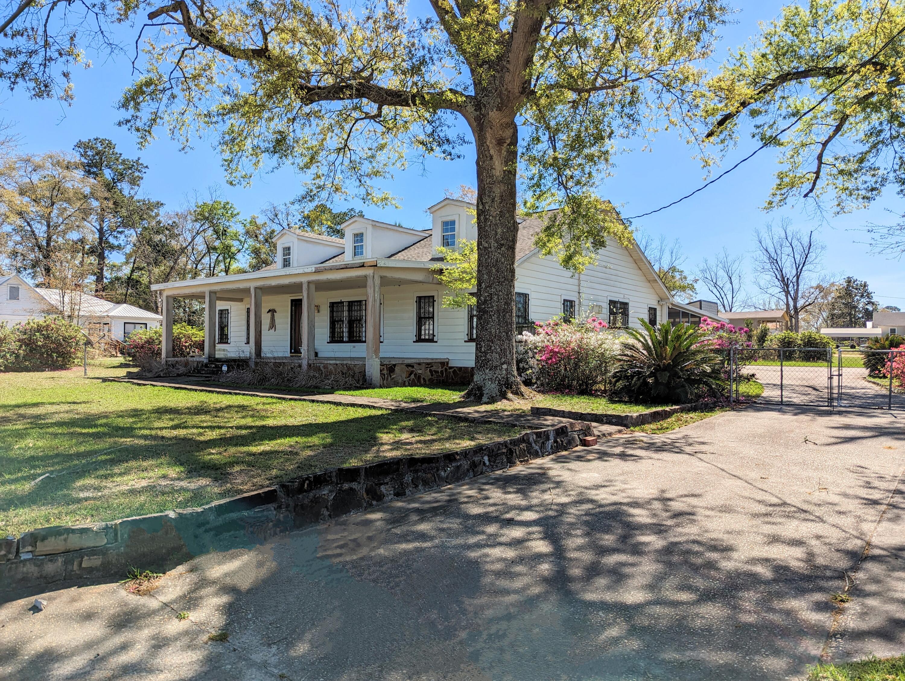 1335 Old Bonifay Road Chipley, FL 32428 - Photo 7 of 31 a view of a house with a yard