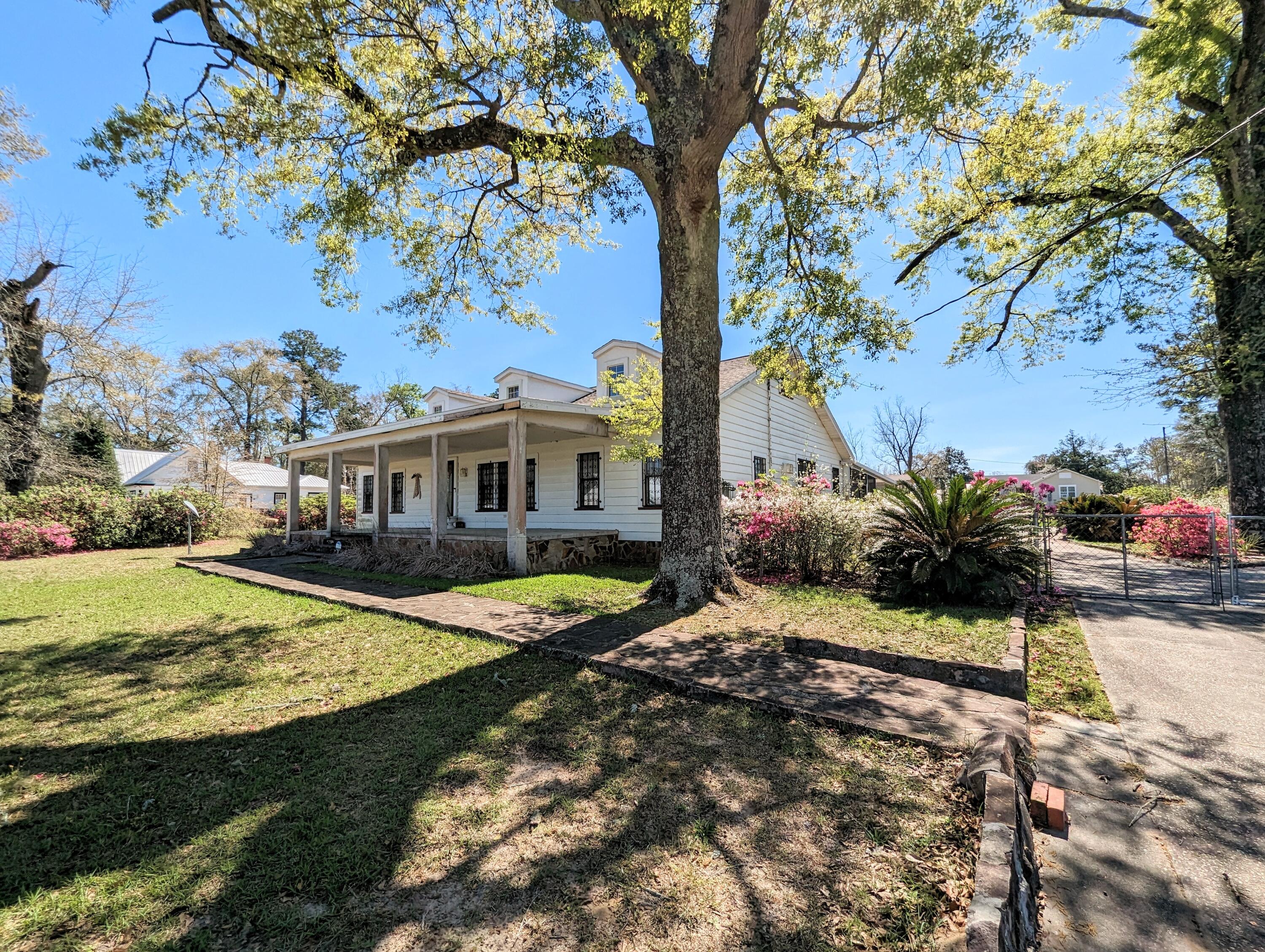 1335 Old Bonifay Road Chipley, FL 32428 - Photo 9 of 31 a view of a house with a yard