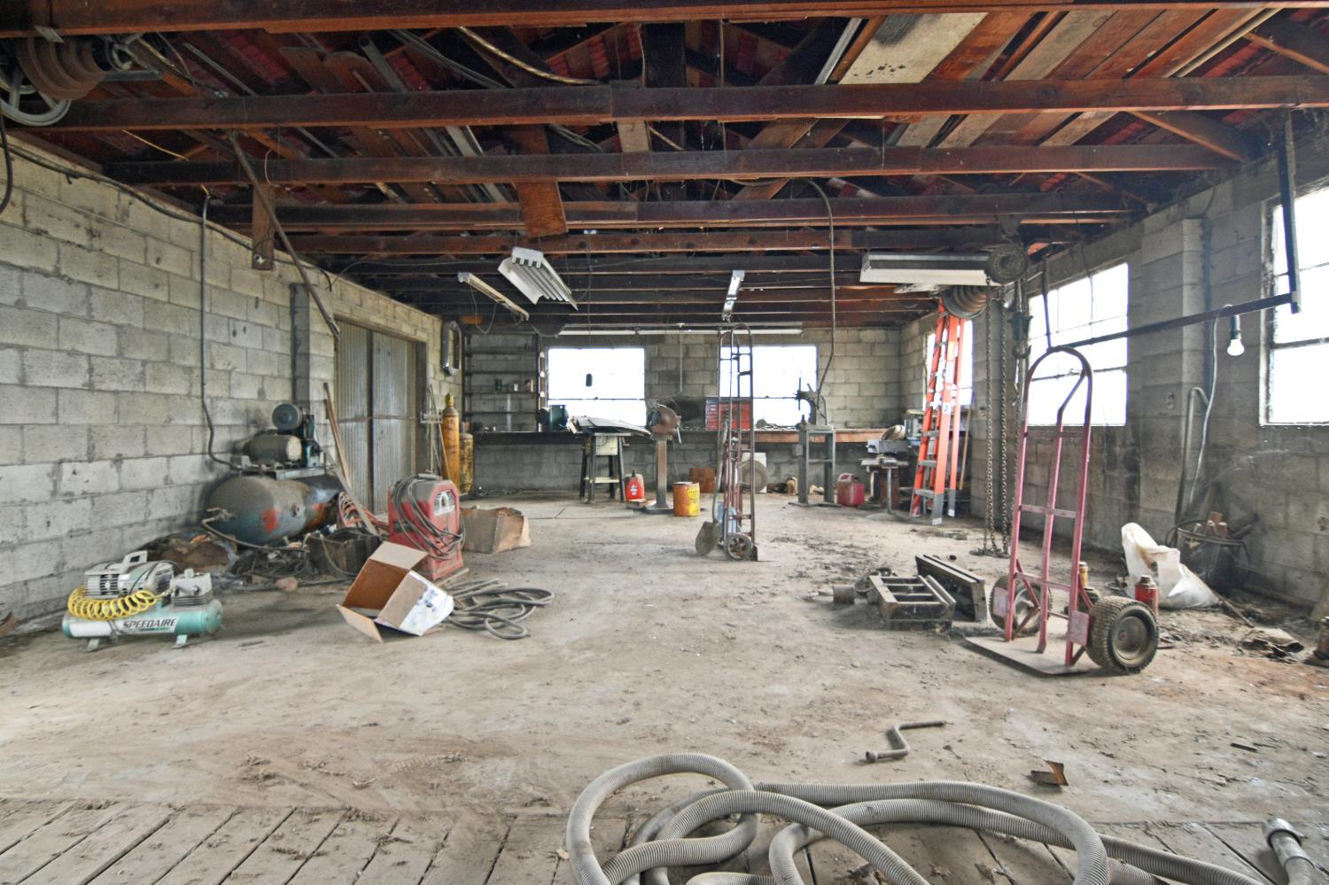 1206 South Verduga Road Turlock, CA 95380 - Photo 28 of 36 a view of a garage with parked cars