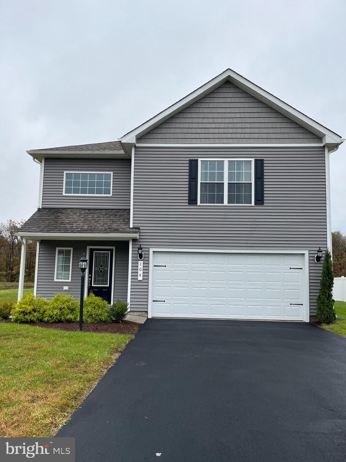 104 Rappahannock Run Falling Waters, WV 25419 - Photo 2 of 54 a front view of a house with a yard