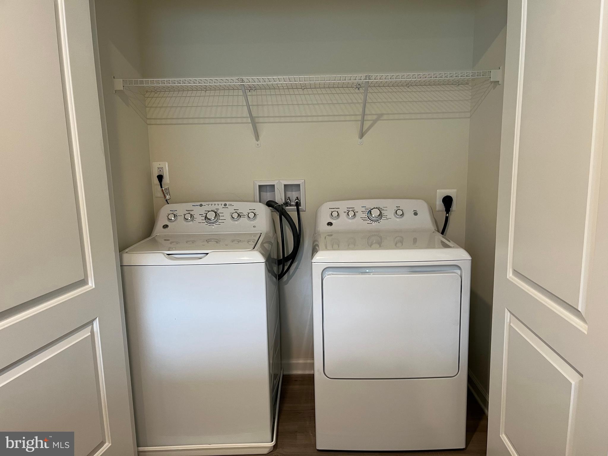 104 Rappahannock Run Falling Waters, WV 25419 - Photo 23 of 54 a utility room with dryer and washer