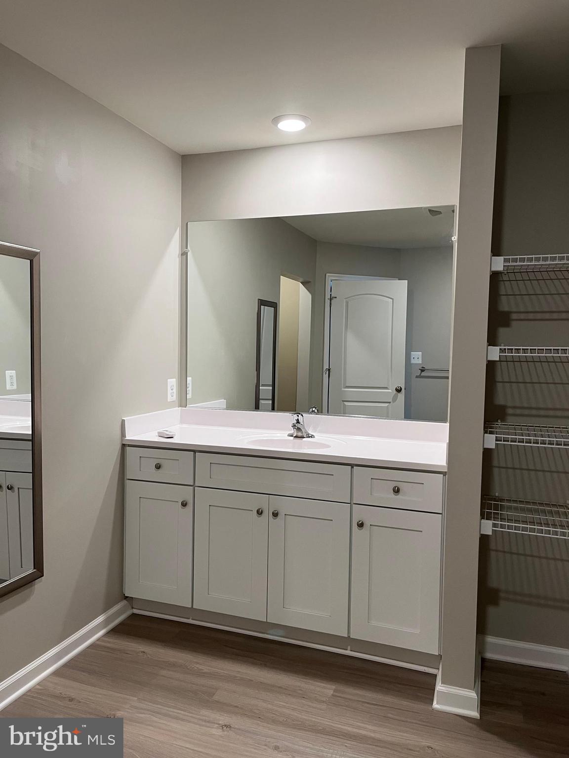 104 Rappahannock Run Falling Waters, WV 25419 - Photo 28 of 54 a spacious bathroom with a double vanity sink and a mirror