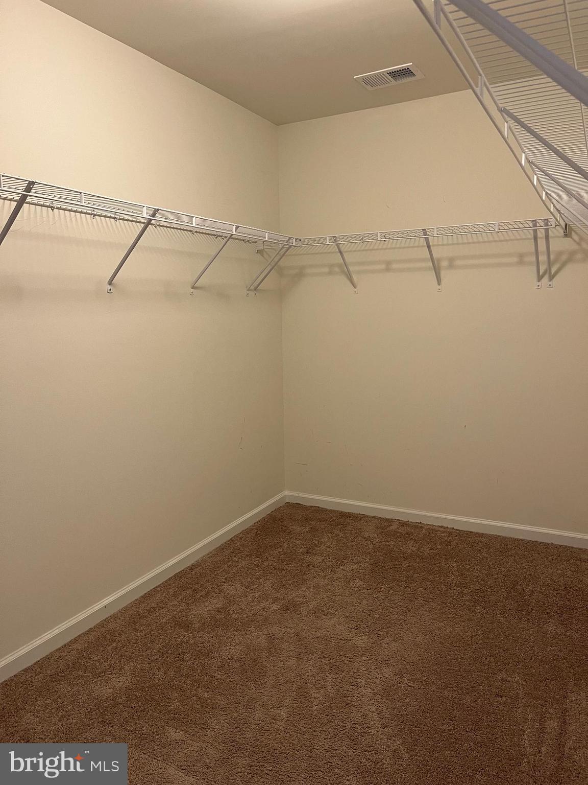 104 Rappahannock Run Falling Waters, WV 25419 - Photo 29 of 54 a view of a room with racks on the wall