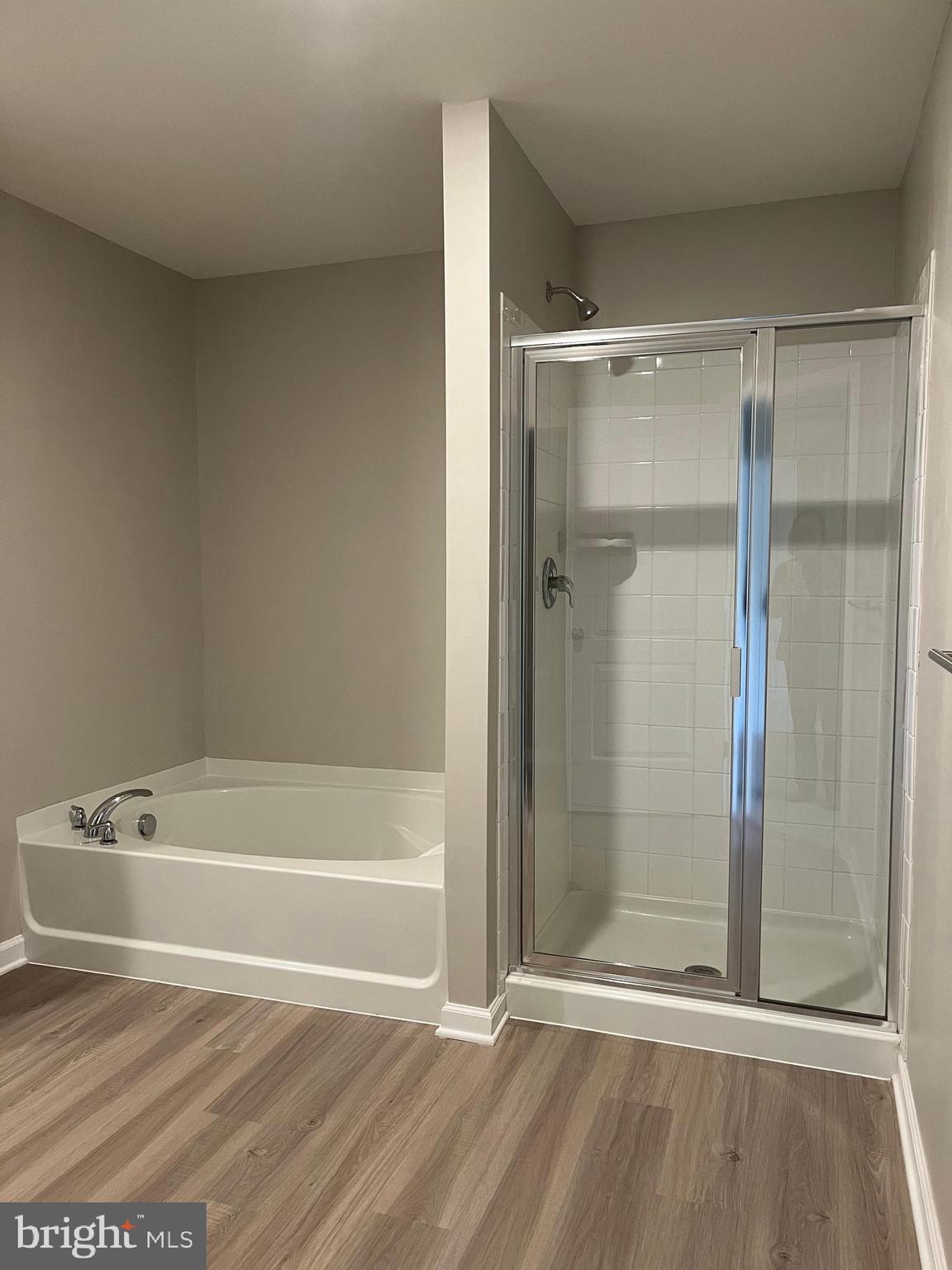 104 Rappahannock Run Falling Waters, WV 25419 - Photo 30 of 54 a bathroom with a bathtub and a shower
