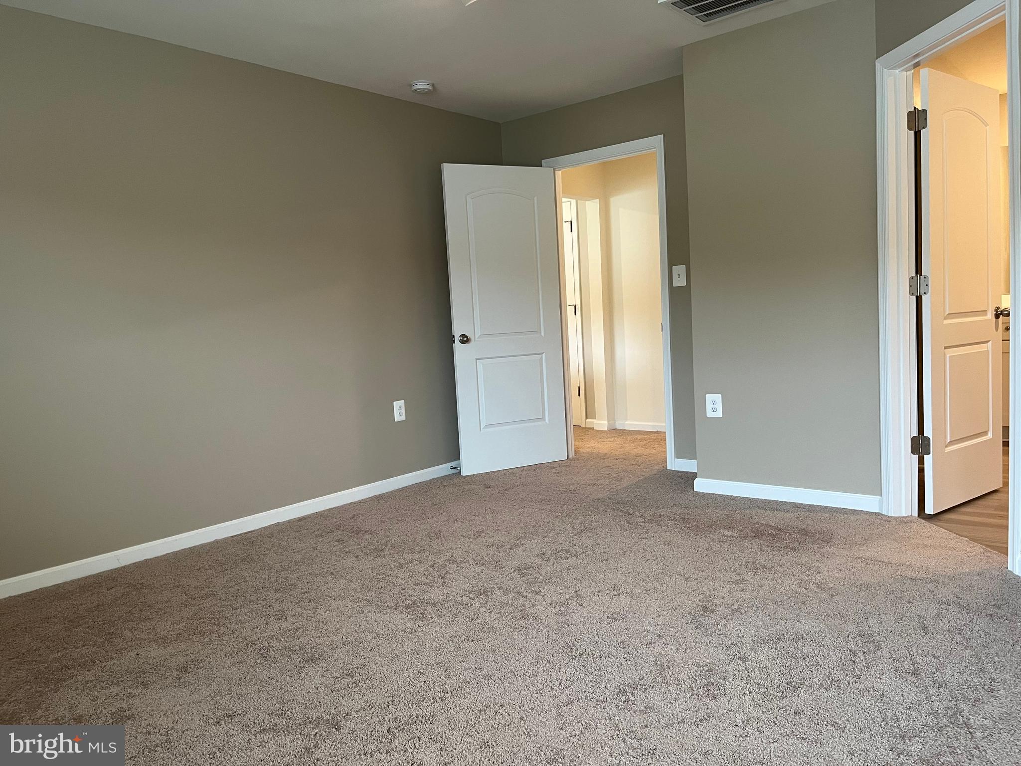104 Rappahannock Run Falling Waters, WV 25419 - Photo 34 of 54 an empty room with windows and closet