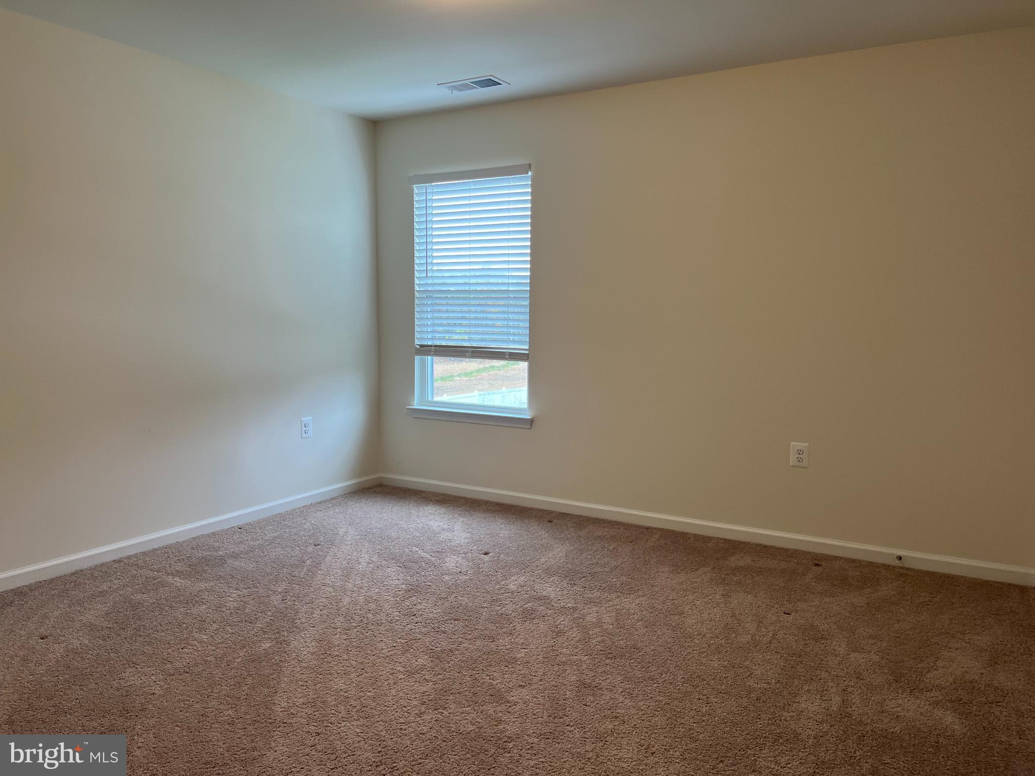 104 Rappahannock Run Falling Waters, WV 25419 - Photo 38 of 54 an empty room with a window