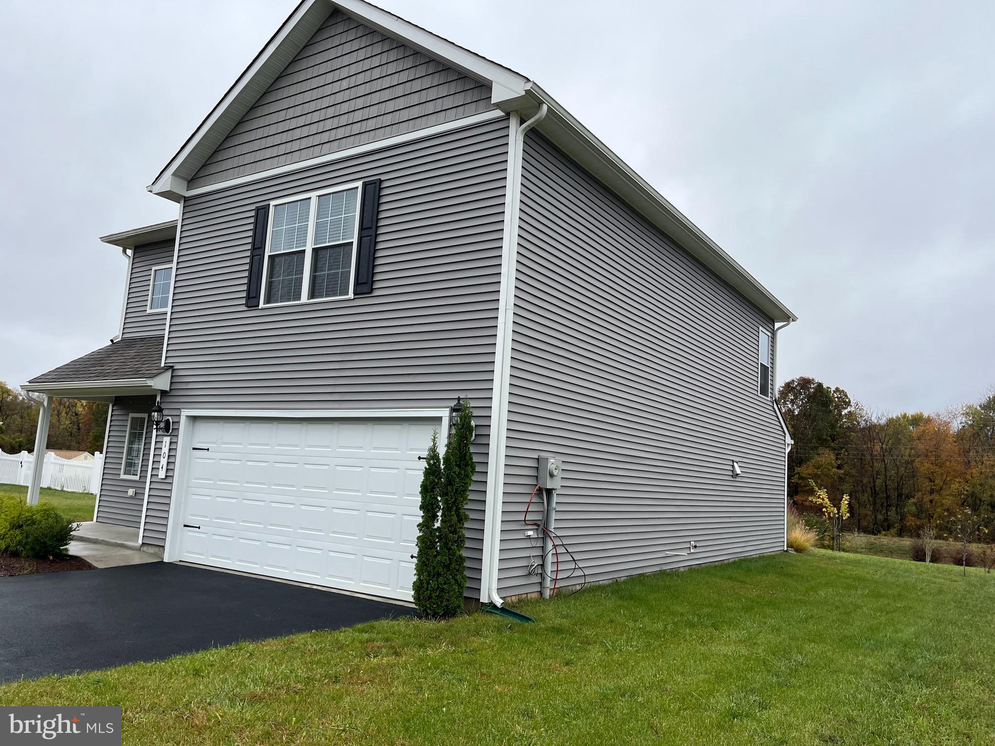 104 Rappahannock Run Falling Waters, WV 25419 - Photo 4 of 54 a front view of a house with a yard