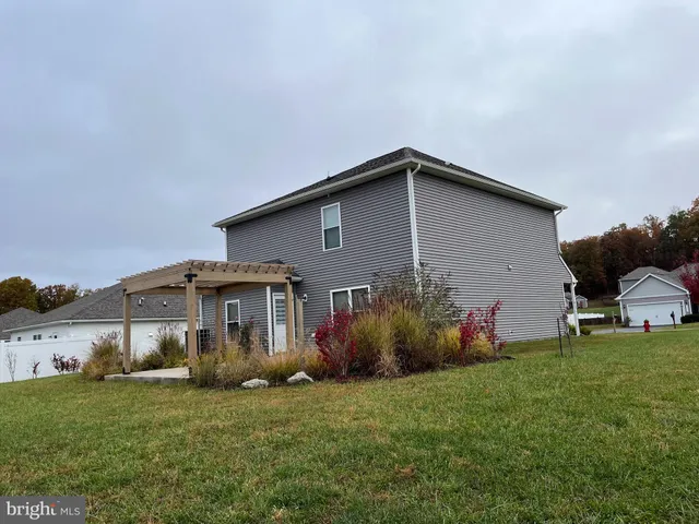 a view of a road with a yard
