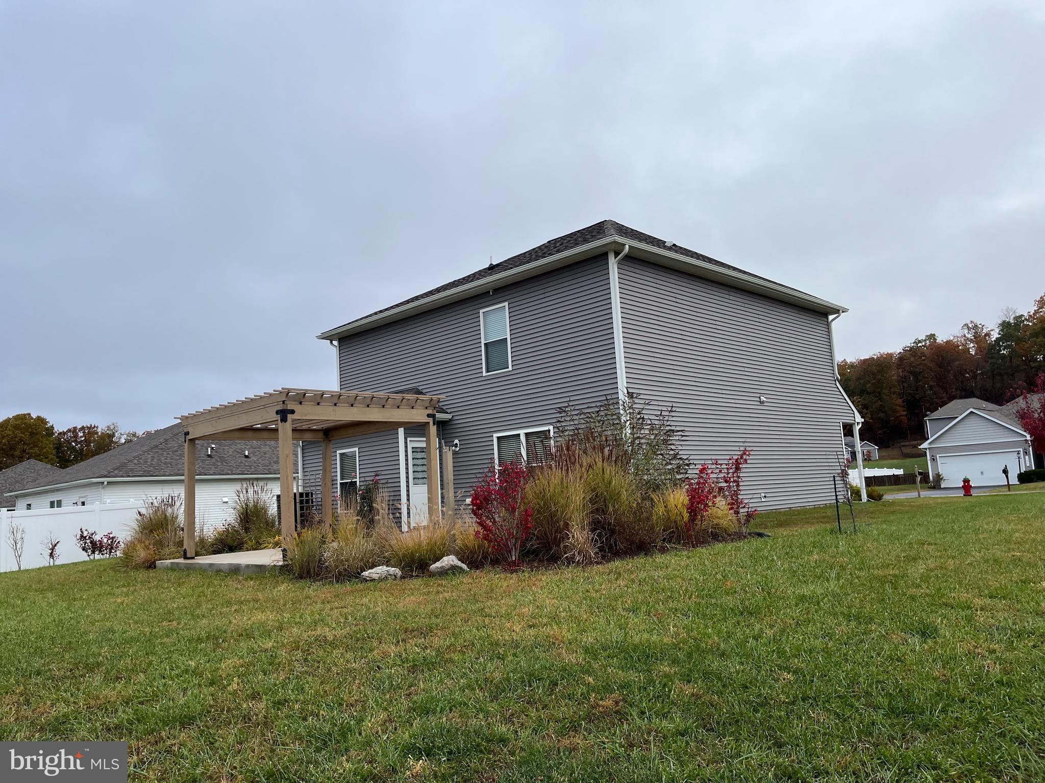 104 Rappahannock Run Falling Waters, WV 25419 - Photo 46 of 54 a front view of a house with garden