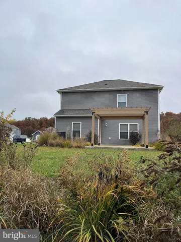 a view of a patio with yard