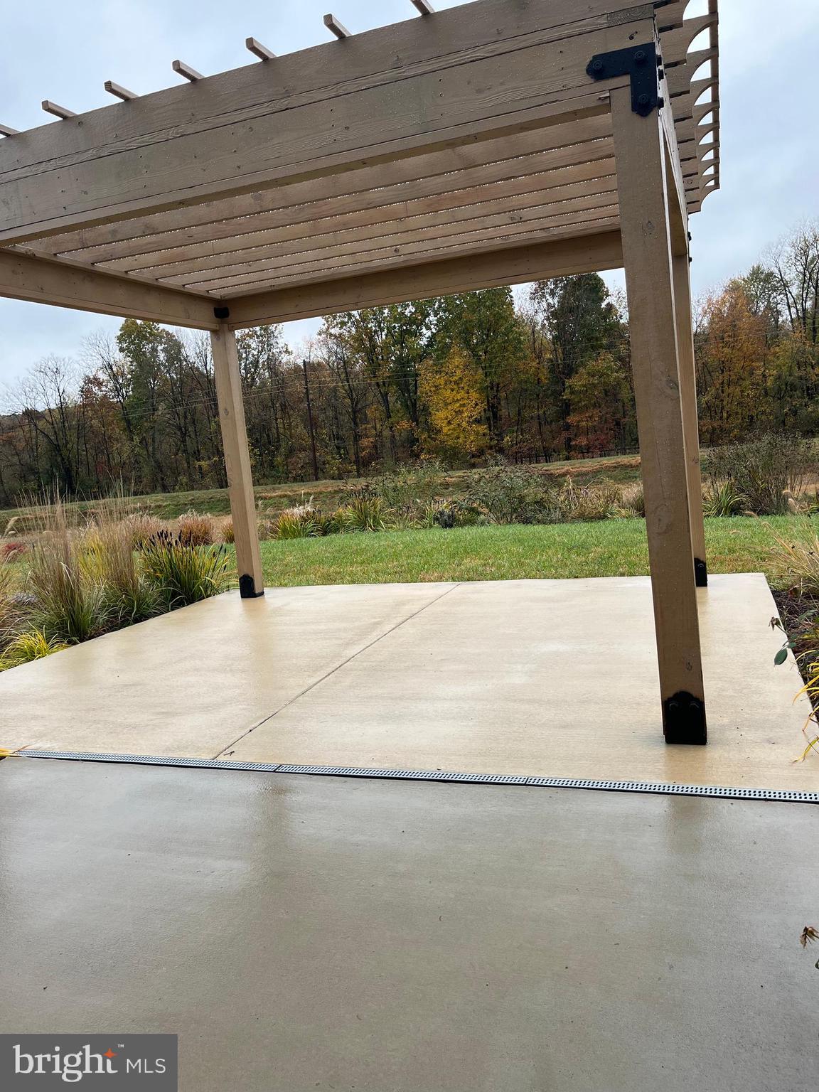 104 Rappahannock Run Falling Waters, WV 25419 - Photo 50 of 54 a view of a patio with yard