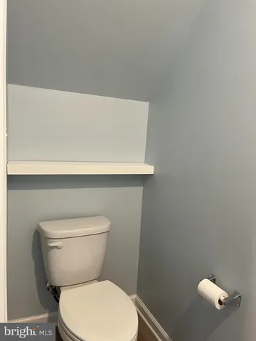 a bathroom with a toilet