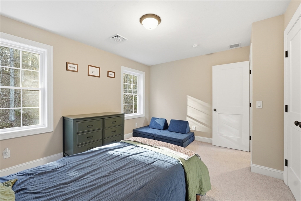 103 Rice Corner Road Brookfield, MA 01506 - Photo 28 of 39 a bedroom with a bed and a window