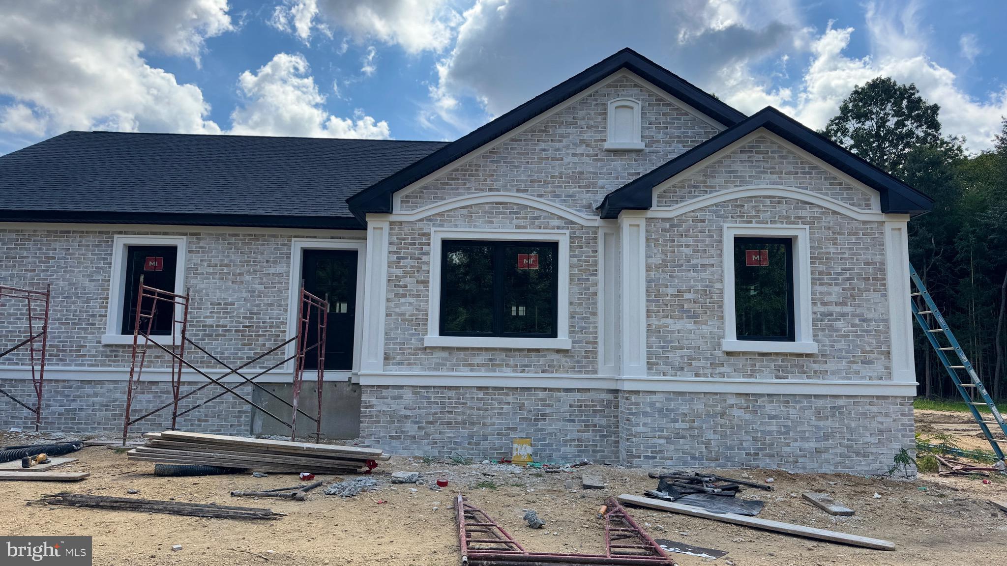 350 Honeymoon Road Glassboro, NJ 08028 - Photo 3 of 23 a front view of a house with garden