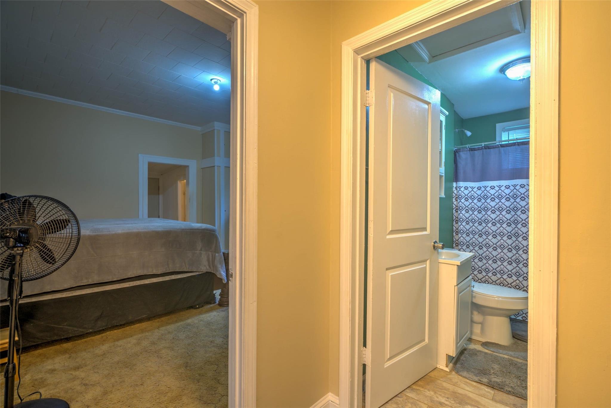 54 Bunker Street Rockingham, NC 28379 - Photo 15 of 22 a bathroom with a granite countertop sink and a mirror