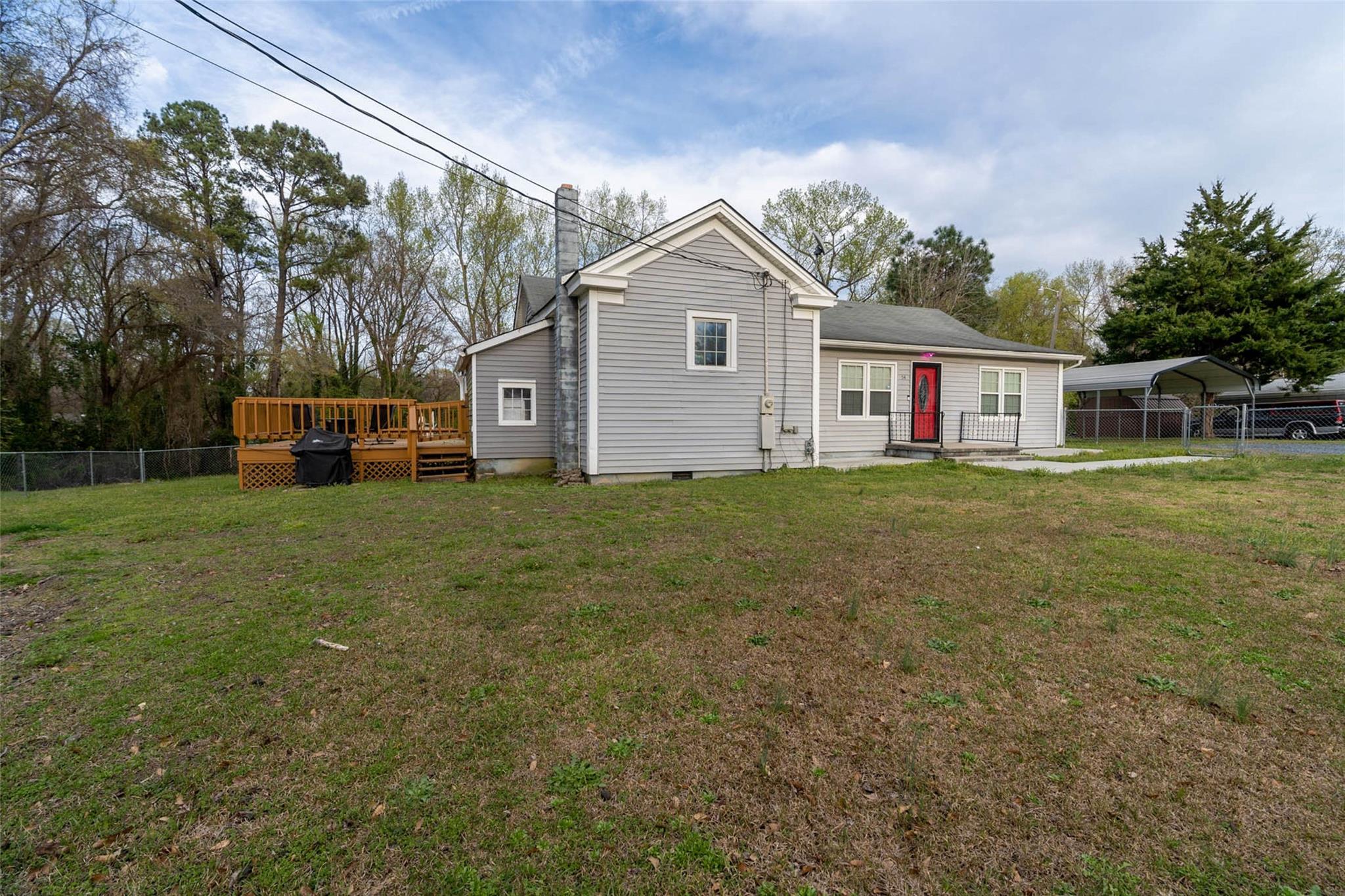 54 Bunker Street Rockingham, NC 28379 - Photo 2 of 22 a front view of house with yard and green space