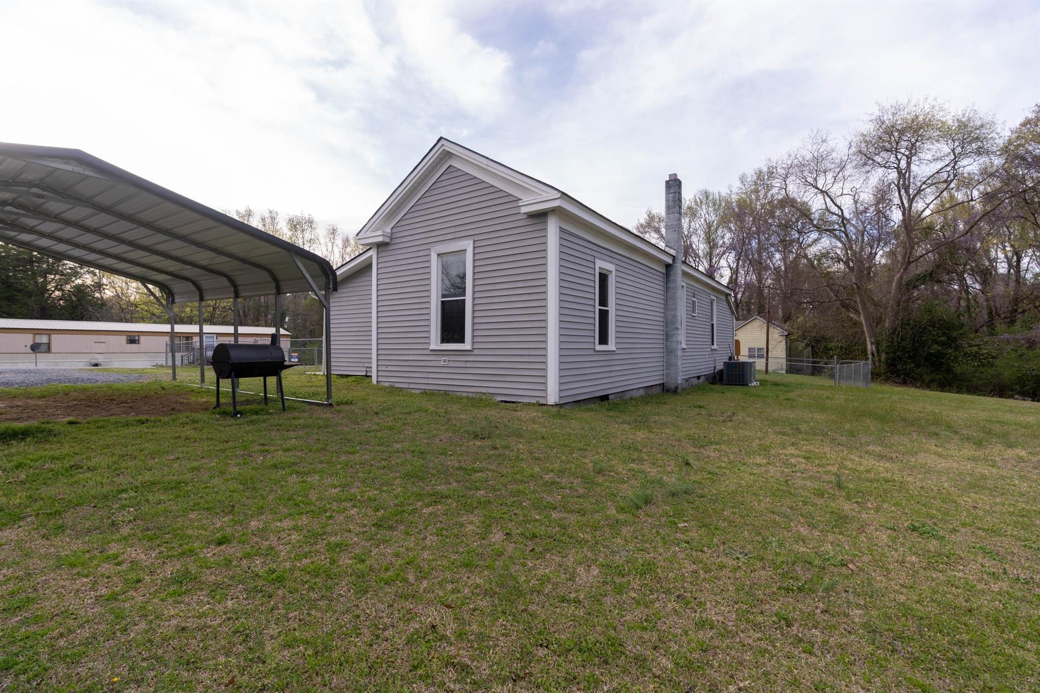 54 Bunker Street Rockingham, NC 28379 - Photo 7 of 22 a view of a backyard of the house
