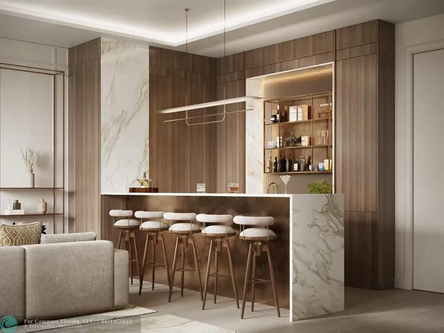 a dinning room with furniture and a window