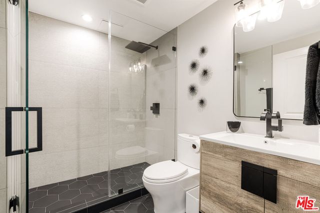 a swimming pool with outdoor seating and yard