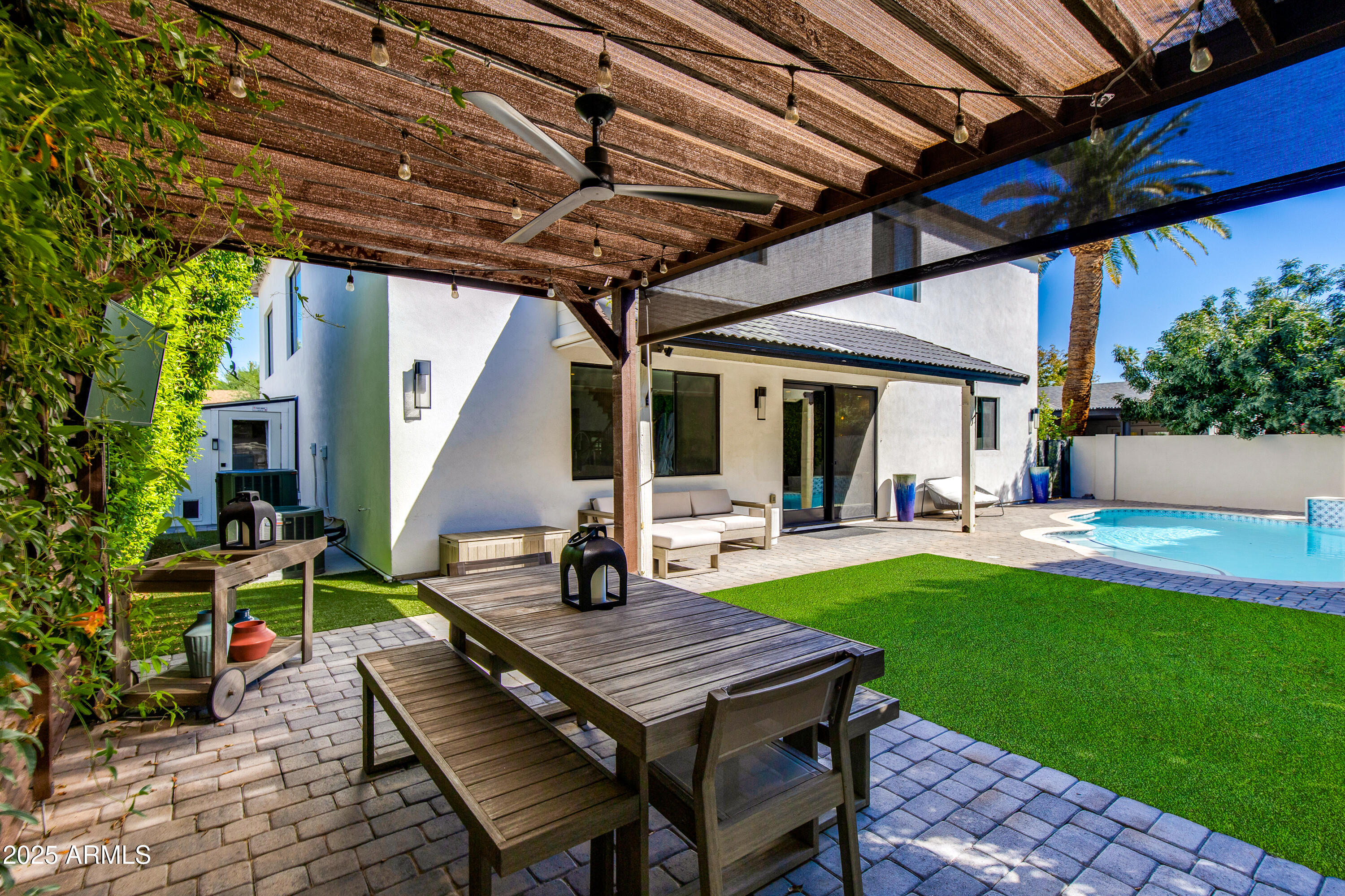 3821 East Devonshire Avenue Phoenix, AZ 85018 - Photo 17 of 20 a view of a backyard with sitting area