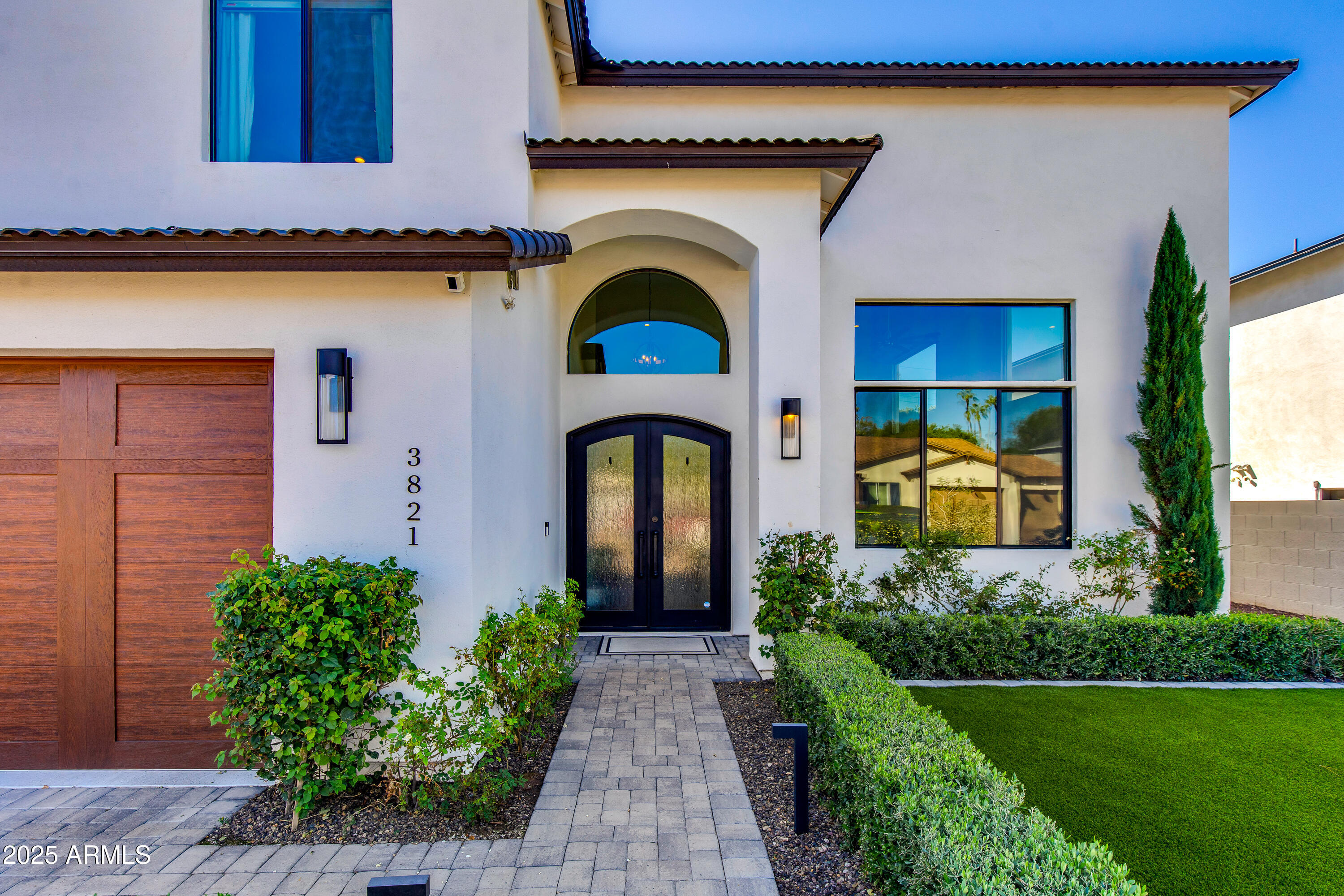 3821 East Devonshire Avenue Phoenix, AZ 85018 - Photo 20 of 20 a front view of a house with garden