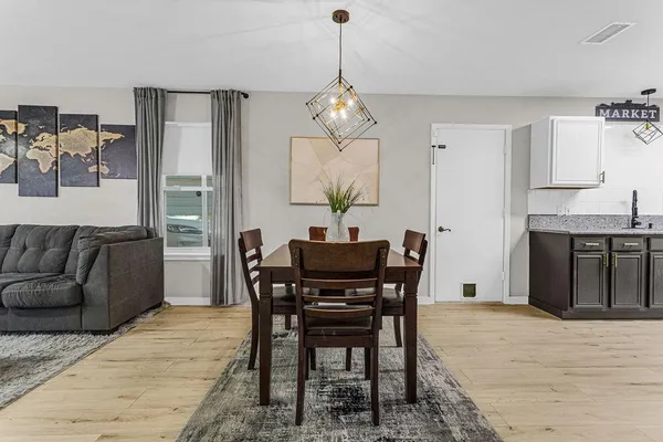 a view of a dining room with furniture