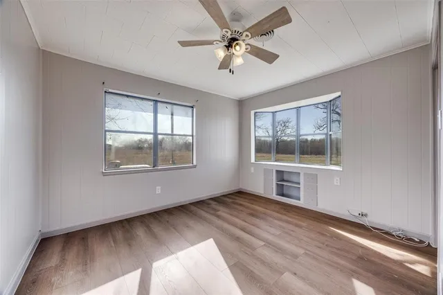 a view of empty room with windows