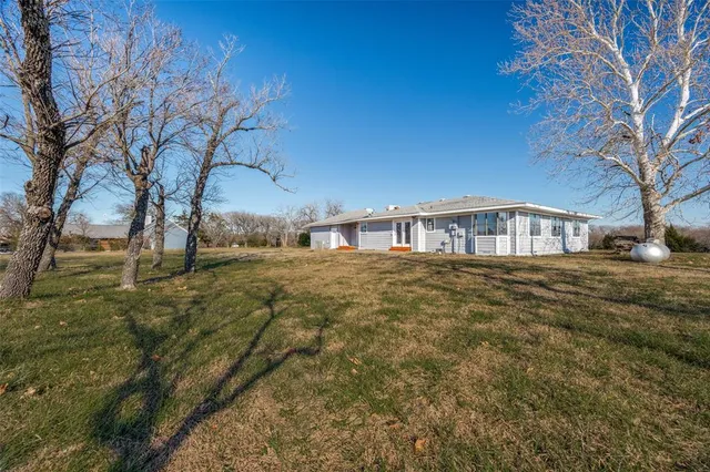 a front view of house with yard
