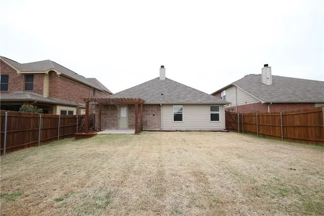 a house view with a outdoor space