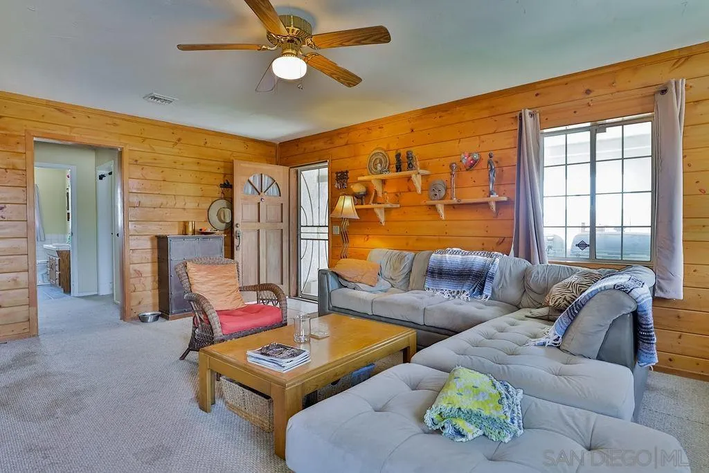 2260 Glenview Lane Vista, CA 92084 - Photo 21 of 24 a living room with furniture and a window