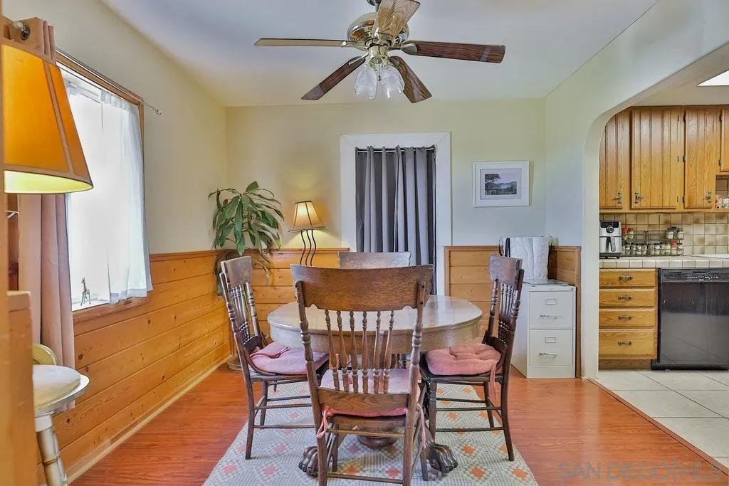 2260 Glenview Lane Vista, CA 92084 - Photo 24 of 24 a view of a dining room with furniture and a chandelier