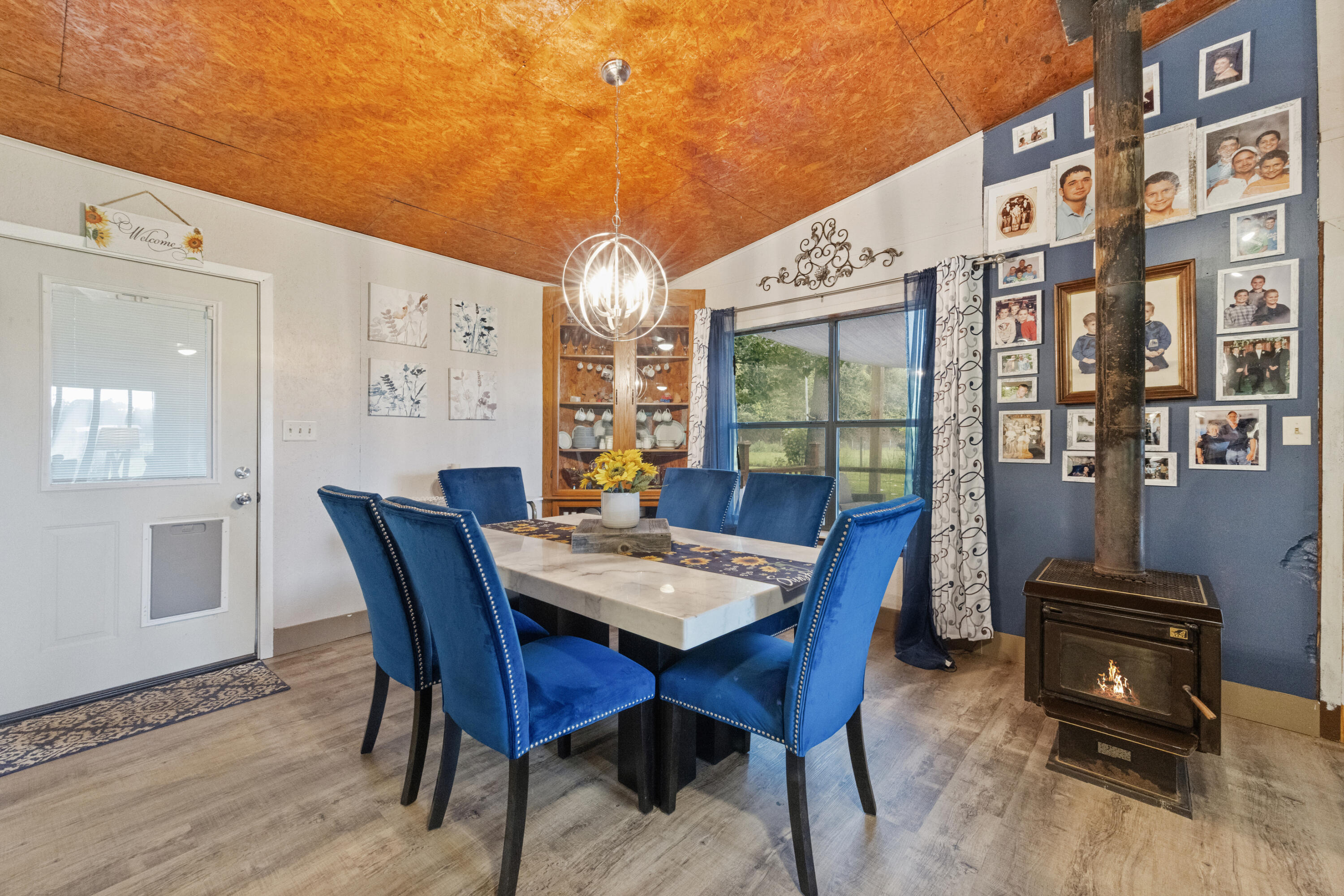 190 Peaden Bridge Road Baker, FL 32531 - Photo 14 of 73 a view of a dining room with furniture window and wooden floor