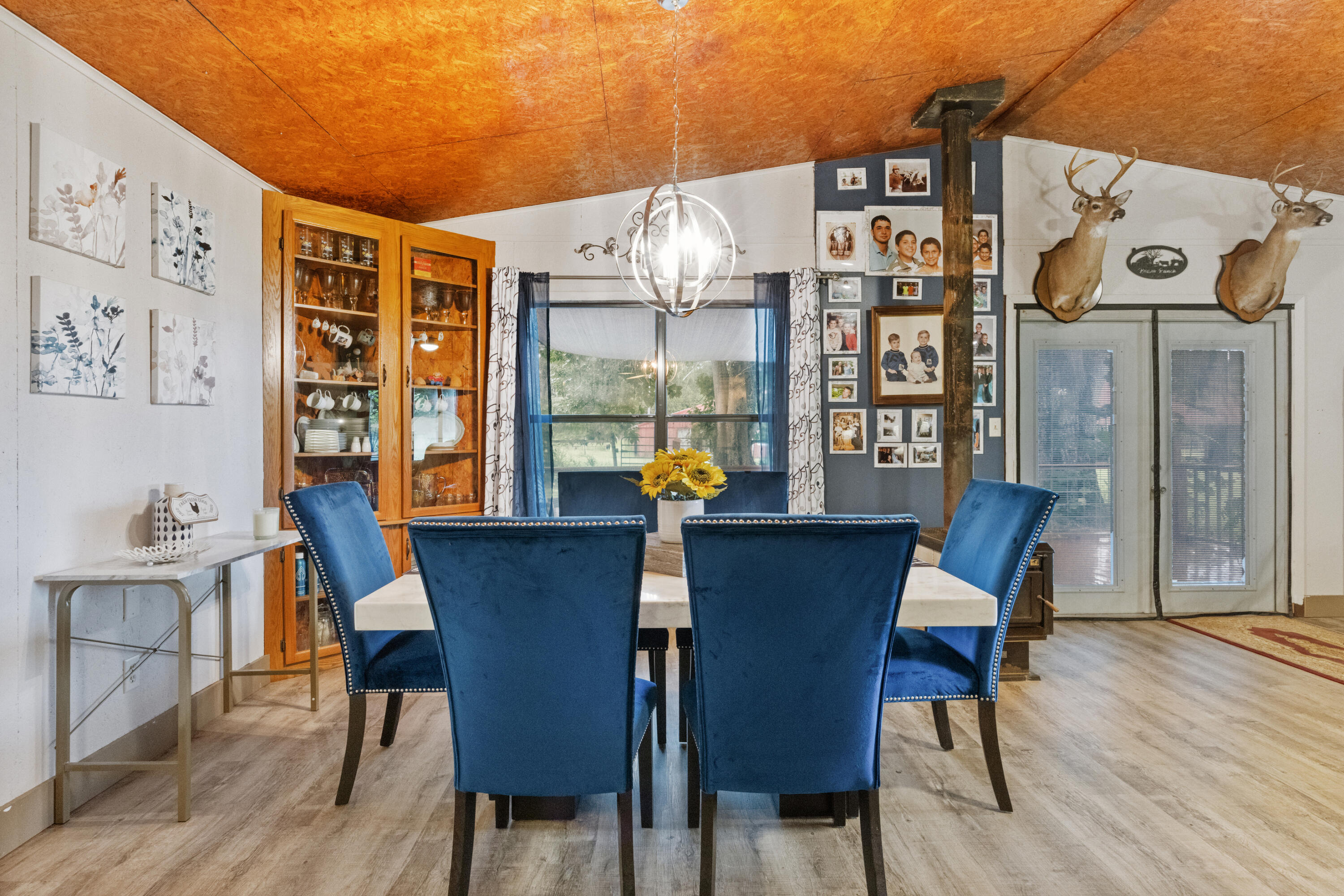 190 Peaden Bridge Road Baker, FL 32531 - Photo 15 of 73 a view of a dining room with furniture and wooden floor